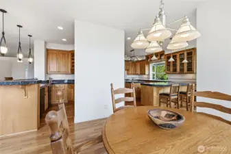 Looking back from the breakfast room to the wet bar and kitchen.
