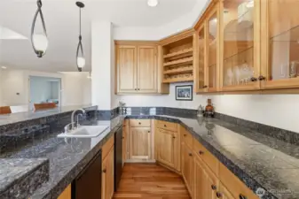 The fabulous wet bar doubles as a butler's pantry.  Imagine throwing your next Seahawks party here!