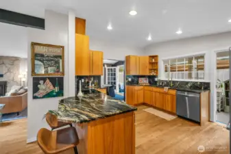 Refreshed kitchen with new counters, sink, and BRAND new fridge.