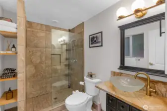 Primary suite bath with walk-in shower.