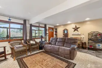 Living room with front door entrance