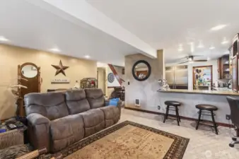 living room with bar eating area