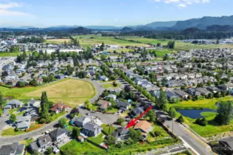 NOTICE THE PRIVACY AFFORDED TO THIS HOME OFF THE BACK YARD BY NEIGHBORING AREA.