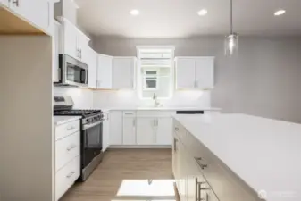 Nice bright kitchen w/ a window over the sink.