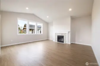 Lots of glass and light in this home with taller ceilings & some taller ceilings.