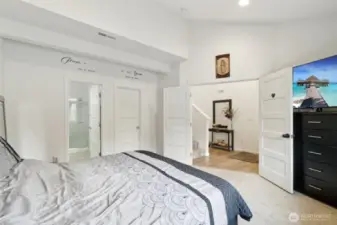 Spacious bedroom on main floor with bathroom and large walk in closet