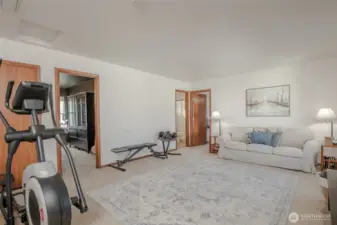 The spacious upstairs bonus room is a blank canvas for your needs—whether it's a home gym, playroom, game room, or anything you envision!