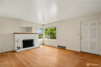 Great natural light in the living room. Peak views of Downtown from this window.