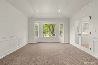 Sunlit front Room (Off entry) with French Doors