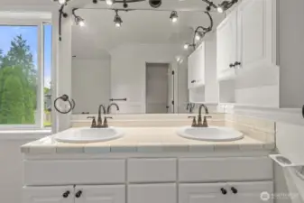 Sundrenched Bath with Dual Sinks and Accent Lighting