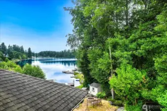 Enjoy the serenity of the lake from the primary bedroom