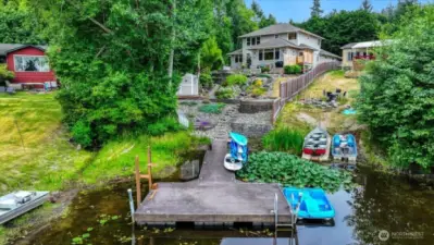 Look at the lanscaping as you walk up the dock to the home