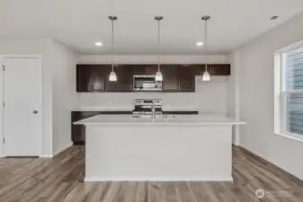 Photos are of the same floor plan in a different community. Finishes may vary.