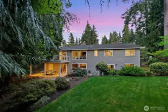 Backyard perspective. Outdoor entertaining in privacy on the 540± sqft waterproof deck.