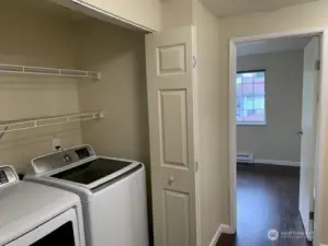 Full sized washer and drier included.