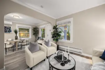 Layout includes a cozy living and dining space at the front of the home