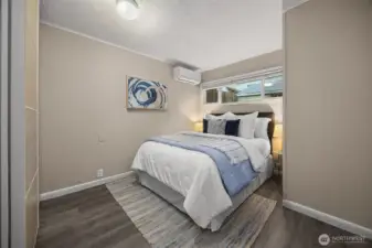 Bedroom with an en suite bathroom with a shower