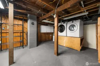 Washer and dryer convey and are located in the spacious unfinished basement.