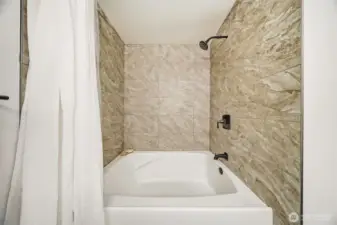 Large soaking tub & shower