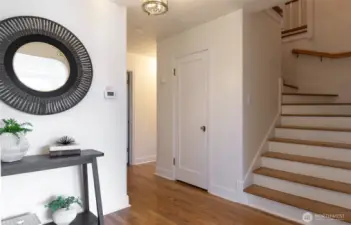 Gleaming oak hardwoods in entryway, spacious