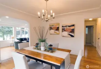 Notice the classic details in the dining room that opens to sunken living room