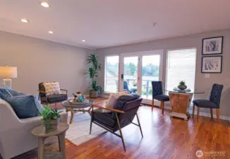 Great room right opens to kitchen with amazing lake views.
