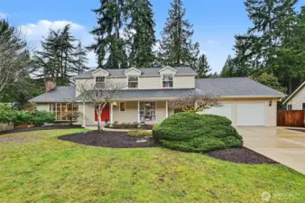 East facing home with great curb appeal in the brightest cul-de-sac of Bridle Trails