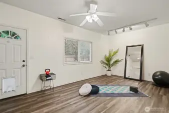 Just off the garage is this  bonus area with separate entrance, ideal for a home office or gym!