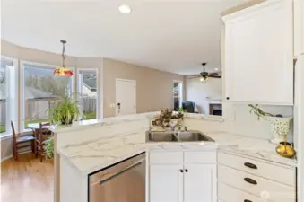 From kitchen looking into the great room and backyard through the windows.