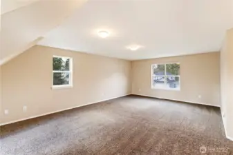 Other end of the bonus room with the other 3 windows. Imagine the possibilities...