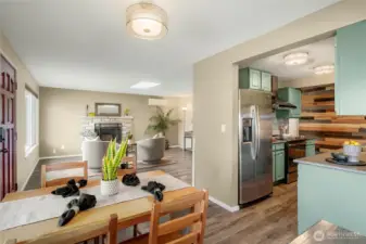 Dining space looking towards kitchen and living room