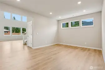 Hard surface flooring graces the entry, living, kitchen and dining areas.