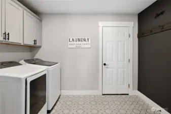 Laundry room off of the garage.