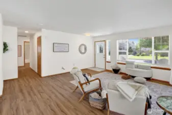 The view down the hallway to the 3 bedrooms & laundry.