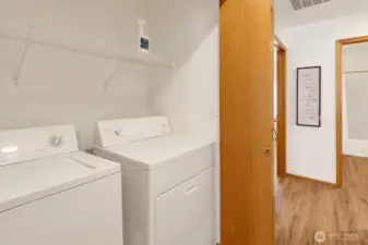 Laundry facilities in the hallway.