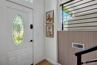 Roomy entry with designer accents.