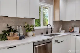 New quartz countertops, new cabinets, new appliances & new sink!