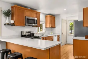 Updated kitchen with an eat-in island.
