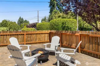 Front paved and fully fenced in front patio.