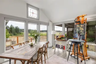 Dining with a wall of windows in the dining or inspiration for art.