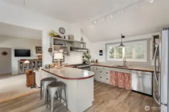 New floors, appliances, open shelving.