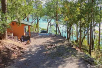 Waterfront Lot with Utilities and Outbuilding On-Site