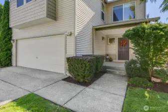 Inviting entry with walkway to covered porch