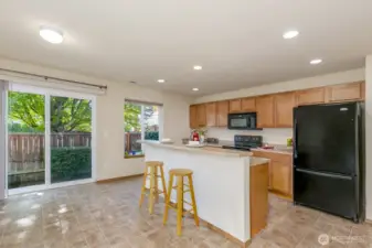 Bright and sunny kitchen with garden view