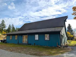 3,600 sqft barn - 2 levels.  Additional covered parking in back.