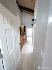 Hallway between the primary bedroom & 2nd upper bedroom.