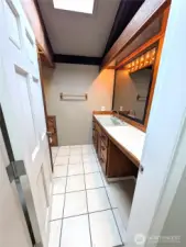 3/4 bath off aforementioned hallway.