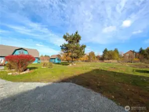 Looking from the back of the driveway towards the detached garage & storage shed.