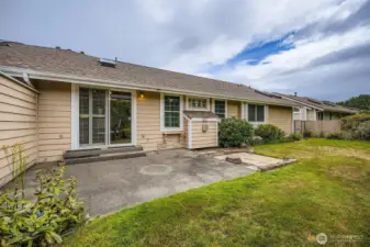 Spacious backyard is fully fenced & mowed by HOA