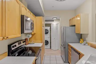 Convenient stacked full-sized washer and dryer.